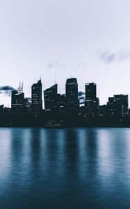 Preview wallpaper city, skyscrapers, shore, evening