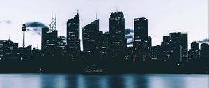 Preview wallpaper city, skyscrapers, shore, evening