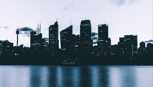 Preview wallpaper city, skyscrapers, shore, evening
