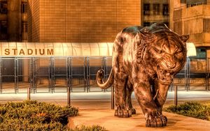 Preview wallpaper city, statue, tiger, metal, hdr