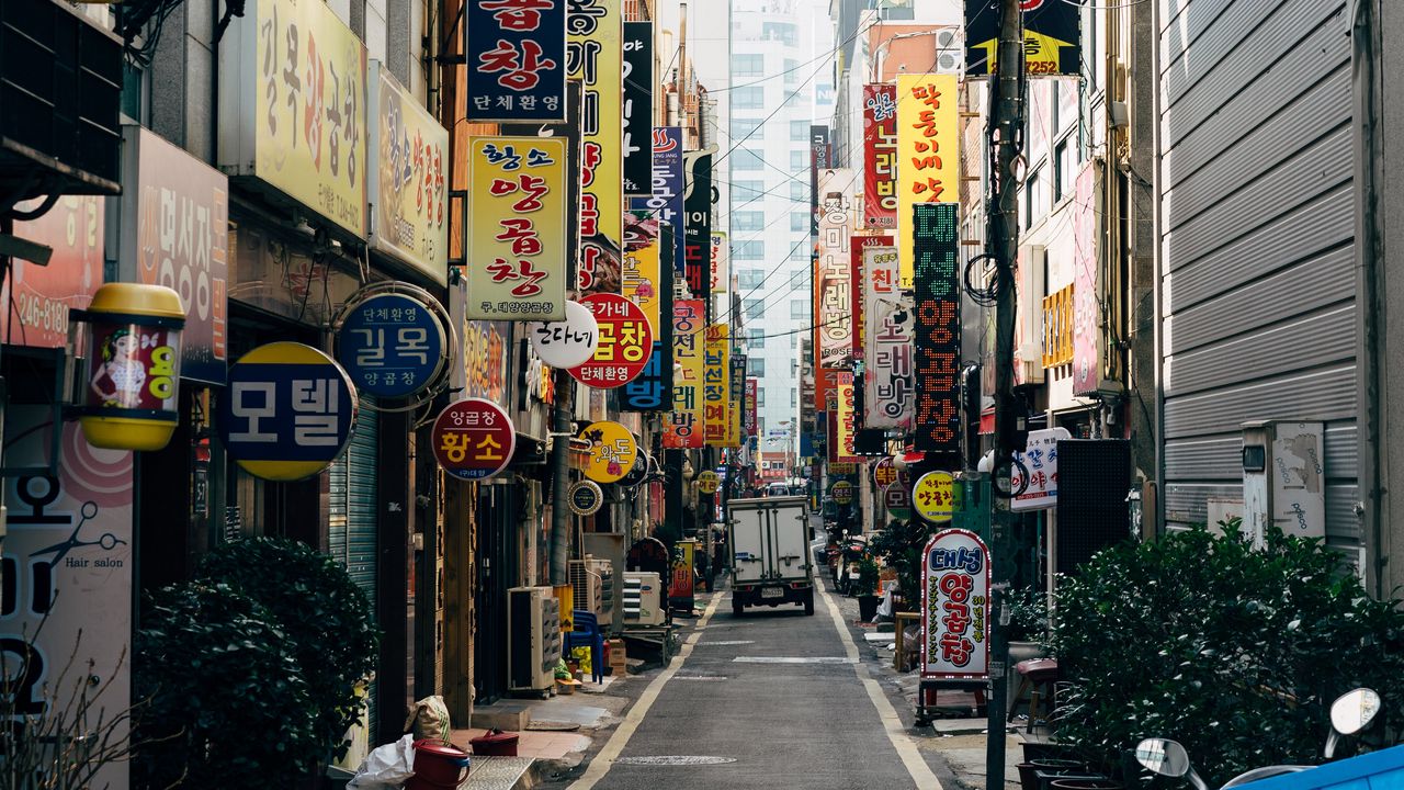 Wallpaper city, street, buildings, hieroglyphs, road