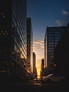 Preview wallpaper city, street, dusk, buildings, cars