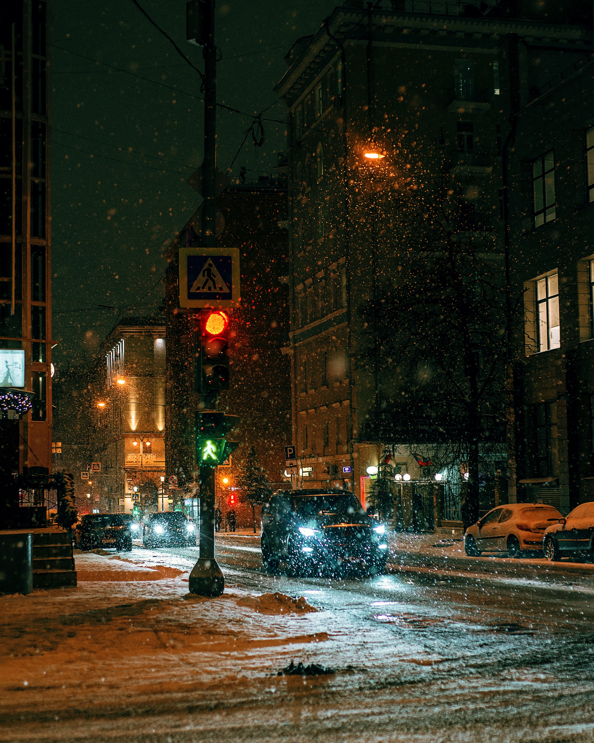 Download wallpaper 2000x2500 city, street, night, snow, cars hd background