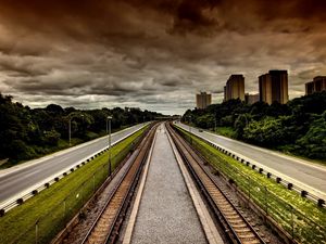 Preview wallpaper city, street, sky, houses, railway