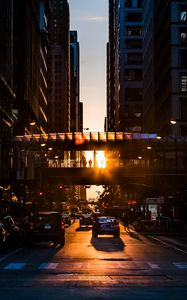 Preview wallpaper city, street, traffic, sunset, transportation