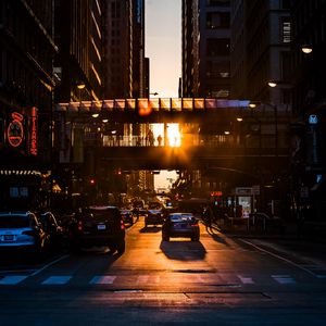 Preview wallpaper city, street, traffic, sunset, transportation