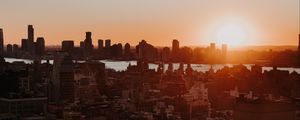 Preview wallpaper city, sunset, aerial view, buildings, sun