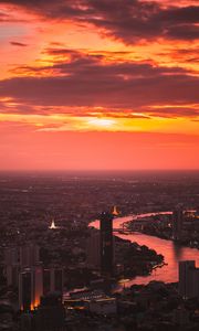 Preview wallpaper city, sunset, aerial view, buildings, river, dusk