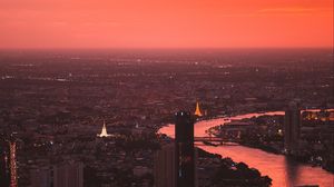 Preview wallpaper city, sunset, aerial view, buildings, river, dusk