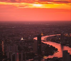 Preview wallpaper city, sunset, aerial view, buildings, river, dusk