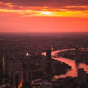 Preview wallpaper city, sunset, aerial view, buildings, river, dusk