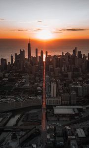 Preview wallpaper city, sunset, aerial view, buildings, sea, coast