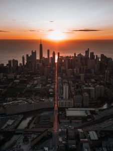 Preview wallpaper city, sunset, aerial view, buildings, sea, coast
