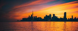 Preview wallpaper city, sunset, evening, water