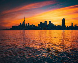 Preview wallpaper city, sunset, evening, water