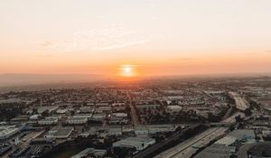 Preview wallpaper city, sunset, roads, buildings, evening