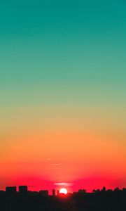 Preview wallpaper city, sunset, sky, horizon, sun