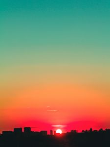 Preview wallpaper city, sunset, sky, horizon, sun
