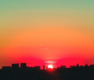Preview wallpaper city, sunset, sky, horizon, sun