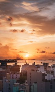 Preview wallpaper city, sunset, sun, evening