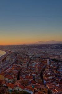 Preview wallpaper city, top view, sunset, sea, buildings