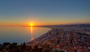 Preview wallpaper city, top view, sunset, sea, buildings