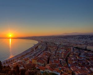 Preview wallpaper city, top view, sunset, sea, buildings