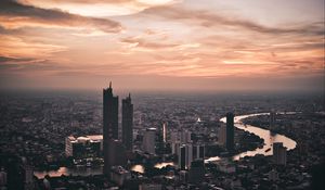 Preview wallpaper city, tower, building, skyscraper, sunset