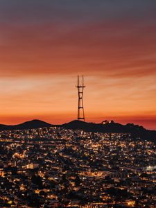 Preview wallpaper city, tower, buildings, lights, sunset
