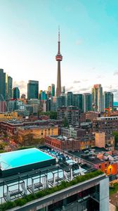Preview wallpaper city, tower, buildings, architecture, roofs, canada