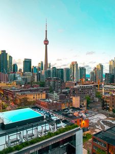 Preview wallpaper city, tower, buildings, architecture, roofs, canada