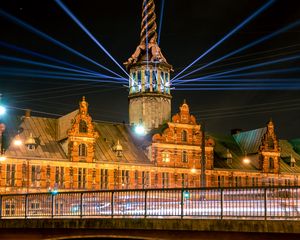 Preview wallpaper city, tower, buildings, bridge, illumination, rays, night