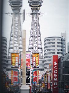 Preview wallpaper city, tower, buildings, architecture, signboards, hieroglyphs, japan