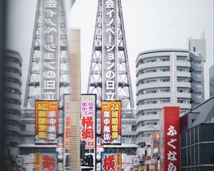 Preview wallpaper city, tower, buildings, architecture, signboards, hieroglyphs, japan