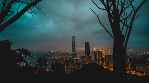 Preview wallpaper city, tower, cityscape, evening, lights, thunderclouds