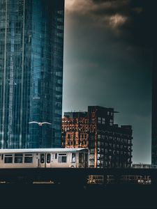 Preview wallpaper city, train, buildings, architecture, dark