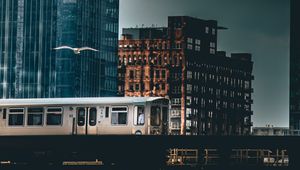 Preview wallpaper city, train, buildings, architecture, dark