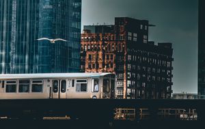 Preview wallpaper city, train, buildings, architecture, dark
