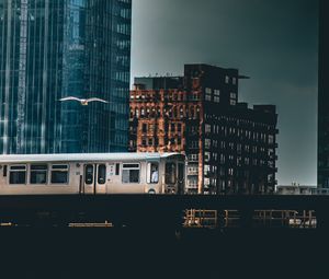 Preview wallpaper city, train, buildings, architecture, dark