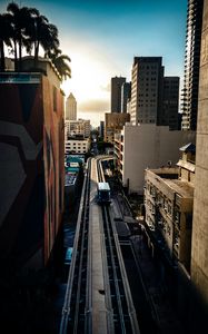 Preview wallpaper city, train, buildings, aerial view