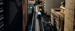 Preview wallpaper city, train, buildings, aerial view