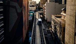 Preview wallpaper city, train, buildings, aerial view