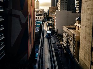 Preview wallpaper city, train, buildings, aerial view