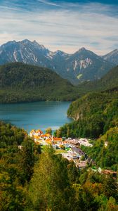 Preview wallpaper city, trees, forest, lake, mountains, clouds, sky, landscape