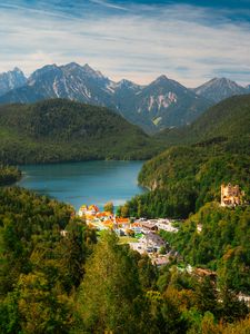 Preview wallpaper city, trees, forest, lake, mountains, clouds, sky, landscape