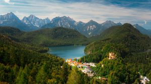 Preview wallpaper city, trees, forest, lake, mountains, clouds, sky, landscape