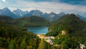 Preview wallpaper city, trees, forest, lake, mountains, clouds, sky, landscape