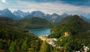 Preview wallpaper city, trees, forest, lake, mountains, clouds, sky, landscape