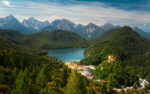 Preview wallpaper city, trees, forest, lake, mountains, clouds, sky, landscape