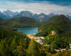 Preview wallpaper city, trees, forest, lake, mountains, clouds, sky, landscape